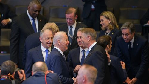 FOTOGALERIE Klaus Iohannis și Joe Biden la summitul NATO, alături de Jens Stoltenberg și Mircea Geoană
