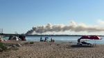 Mesaj RO Alert pentru degajări de fum trimis locuitorilor din Agigea, după un incendiu de gunoi și fier vechi în Portul Constanța / Norul de fum, observat de pe plaja din Eforie Nord