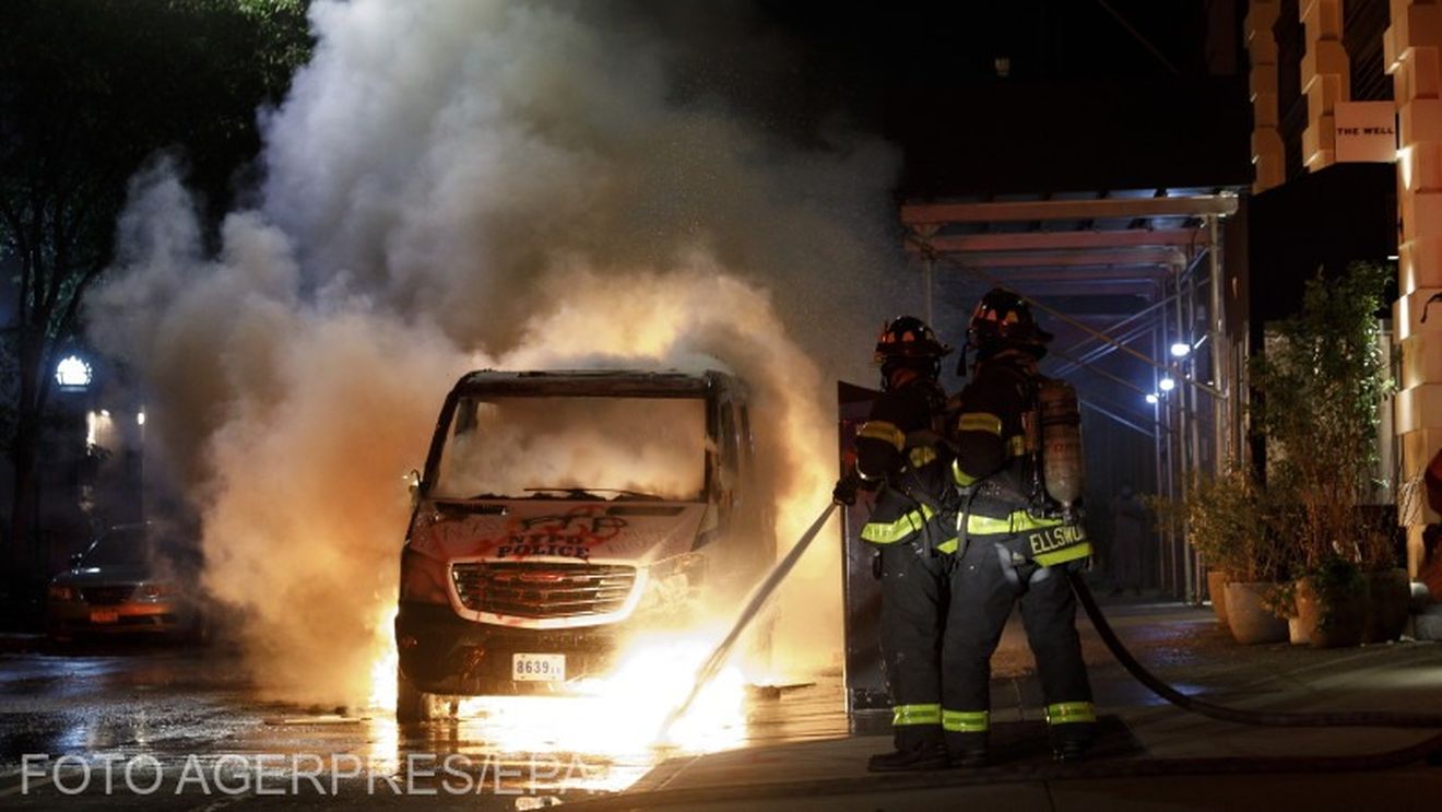 Oraşele americane, sub înaltă tensiune după moartea lui George Floyd: Mii de polițiști și soldați pe străzi, traficul rutier întrerupt, maşini şi magazine incendiate