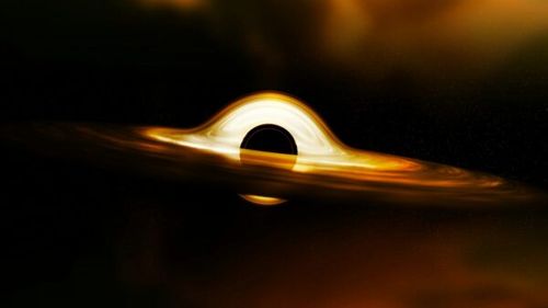 Astronomii descoperă o gaură neagră care "sfâşie" o stea aflată departe de centrul galaxiei