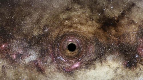 O gaură neagră ultra-masivă, cu o masă „de 30 de miliarde de ori mai mare” decât cea a Soarelui, descoperită de astronomi britanici