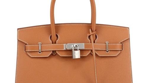 Singapore vinde genți Hermès și lingouri de aur confiscate în cel mai mare caz de spălare de bani din istoria țării