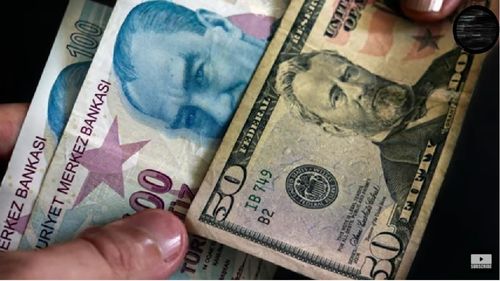 Lira turcească atinge un nou minim în raport cu dolarul