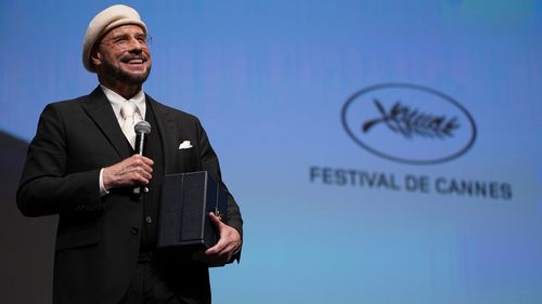 John Travolta a primit un Palme d'Or surpriză la festivalul de film de la Cannes