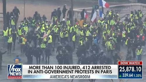 Cine sunt „vestele galbene”, protestatarii care au vandalizat Arcul de Triumf și au scris pe monument ”Detronați burghezia!”