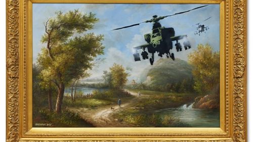 Două lucrări de Banksy din colecţia cântăreţului Robbie Williams, vândute la Londra pentru 8,7 milioane de euro