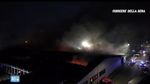 Incendiu uriaș în Milano, la depozite ale compania de curierat Bartolini / Explozii urmate de un nor sufocant de fum, pe o caniculă infernală
