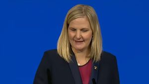 Kirsty Coventry, în istorie - Prima femeie aleasă în funcția de președinte al Comitetului Internaţional Olimpic