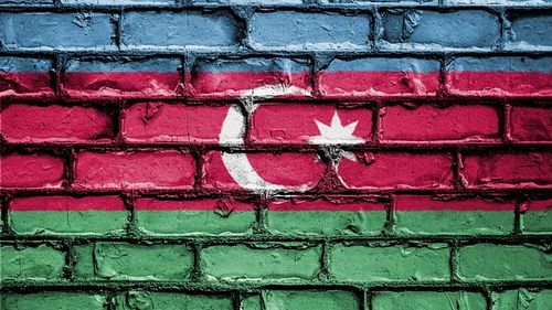 Tensiuni în relaţiile dintre Azerbaidjan şi Rusia: Poliția a făcut percheziții la sediul Sputnik din Baku / Doi presupuşi agenţi ai serviciilor de informaţii ruse, care ar fi activat sub acoperire, ca jurnaliști, au fost arestați (presa azeră)