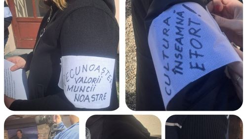 Angajaţi ai Muzeului Judeţean de Istorie şi Artă din Zalău au protestat purtând banderole albe, la vernisajului expoziţiei „Graffiti de altădată”