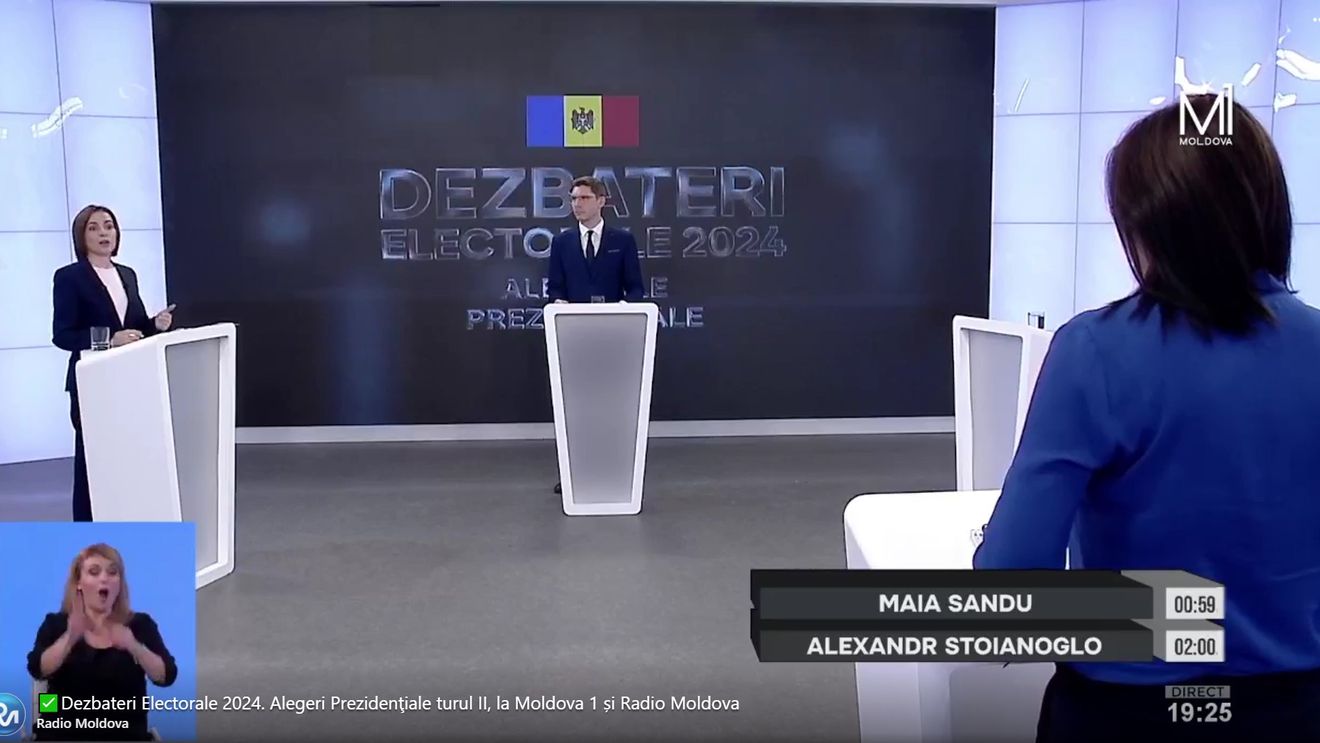 VIDEO Maia Sandu a început a doua dezbatere prezidențială cu un mesaj în limba rusă / Alexandr Stoianoglu, candidatul pro-rus, a refuzat să mai vină la dezbatere după ce a fost pus în dificultate de mai multe ori în prima întâlnire