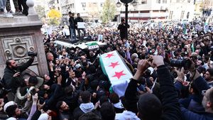Sirienii cer dreptate la funeraliile activistului care a devenit un simbol al brutalității regimului de la Damasc / Mazen al-Hamada a fost deținut și torturat după revolta din 2011 împotriva regimului Assad