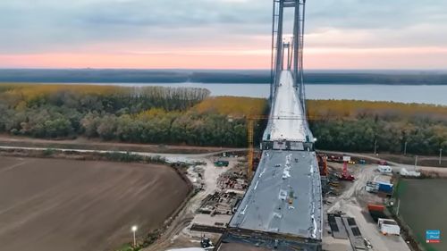 OFICIAL. CNAIR recunoaște că Podul de la Brăila nu poate fi deschis până la sfârșitul anului, deși Ciucă și Grindeanu au promis inaugurarea în decembrie. Drumurile de legătură sunt la doar 40% execuție