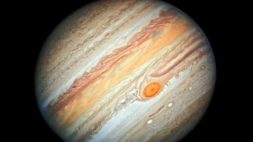 FOTO Cercetătorii NASA au descoperit că Marea Pată Roșie de pe planeta Jupiter este mult mai adâncă decât se credea anterior