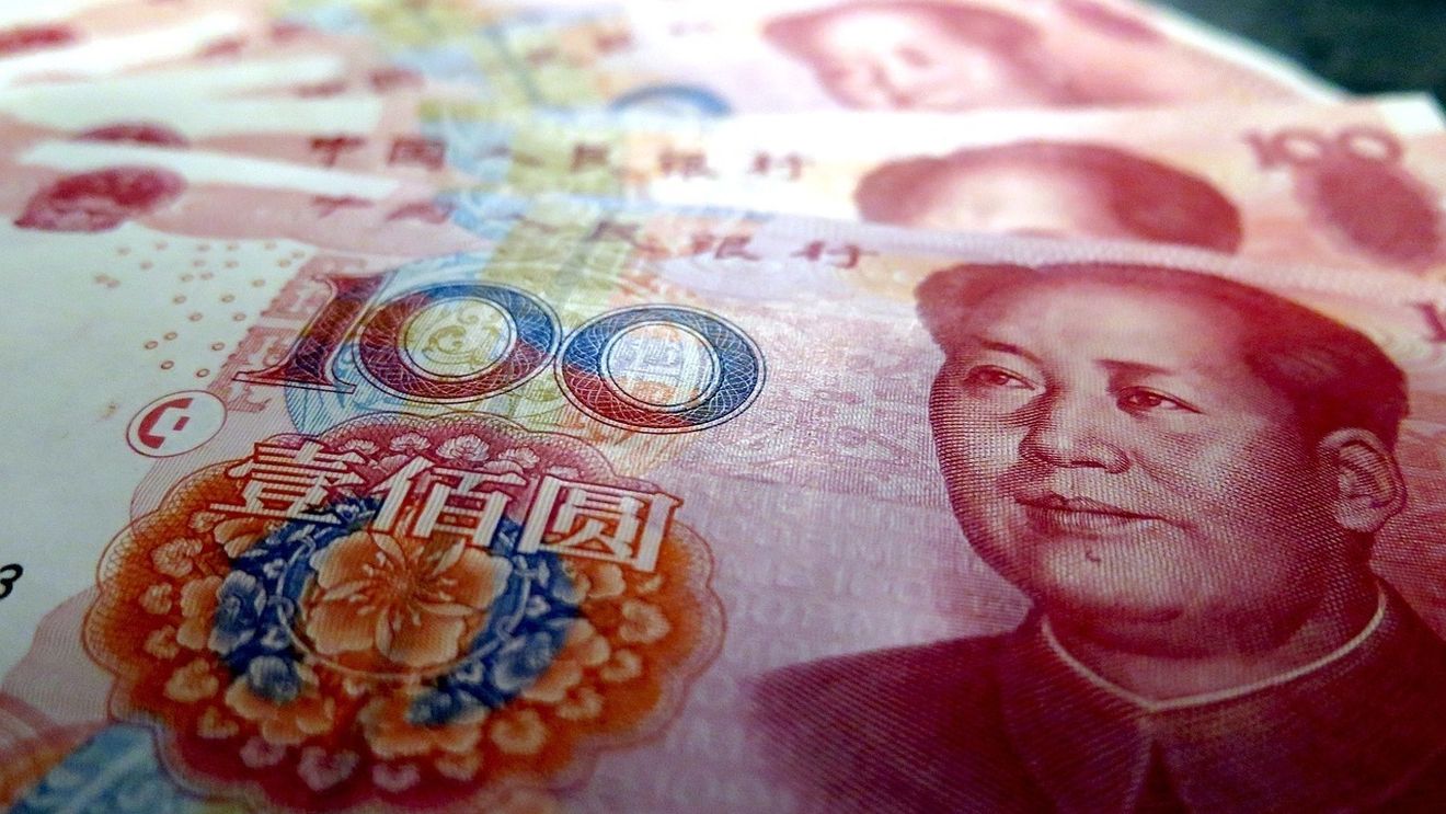 Banca centrală a Chinei reduce două dobânzi-cheie la minime record