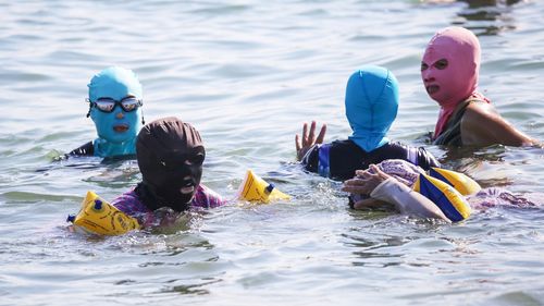 „Facekini” devin tot mai populare în China pe măsură ce temperaturile doboară noi recorduri