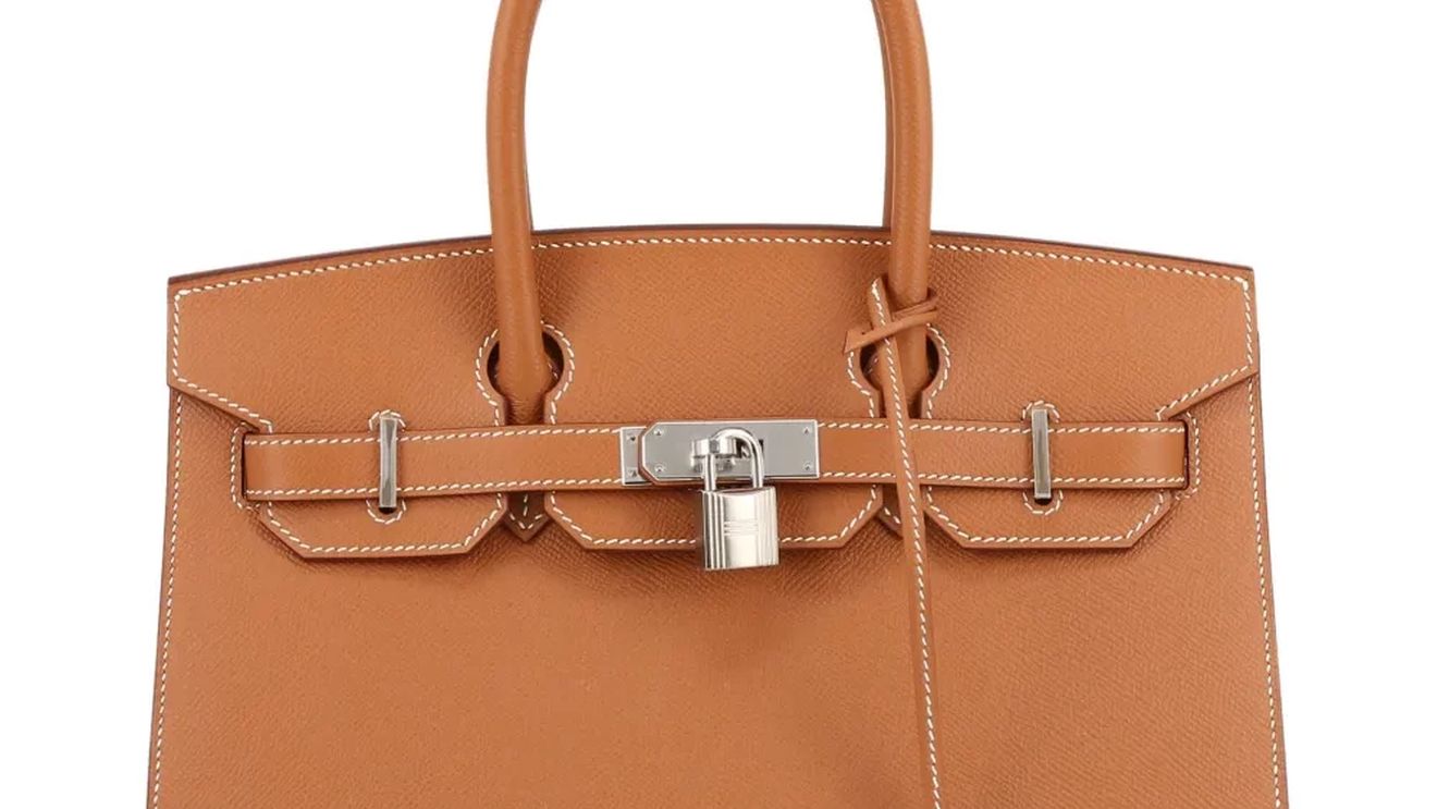 Singapore vinde genți Hermès și lingouri de aur confiscate în cel mai mare caz de spălare de bani din istoria țării