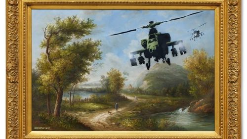 Două lucrări de Banksy din colecţia cântăreţului Robbie Williams, vândute la Londra pentru 8,7 milioane de euro