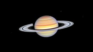 FOTO Telescopul Hubble surprinde umbrele misterioase de pe inelele lui Saturn / Razele pot părea mici în imagini, dar ele pot fi de fapt mai mari decât Pământul în lățime și diametru