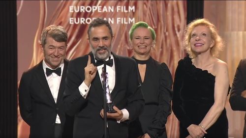 VIDEO ”Triangle of Sadness” a obținut patru trofee la gala premiilor Academiei de Film Europene/ ”Mariupolis 2”, cel mai bun documentar': Trofeul a fost înmânat fiicei regizorului Mantas Kvedaravicius, ucis în Ucraina