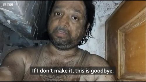 VIDEO Un bărbat prins sub o clădire care s-a prăbușit și-a filmat calvarul pentru a-i lăsa un mesaj soției