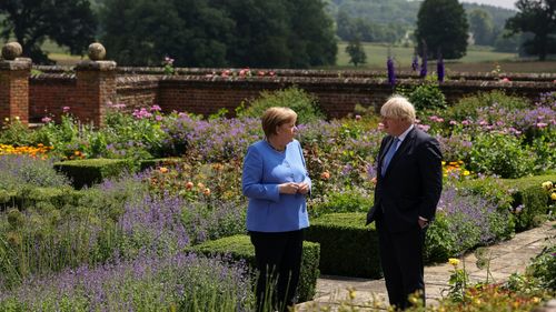 Boris Johnson și Angela Merkel, de acord cu privire la necesitatea unei cooperări globale privind situația din Afganistan