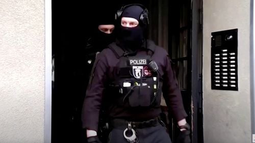 Trei germani suspectați de spionaj în favoarea Chinei au fost arestați